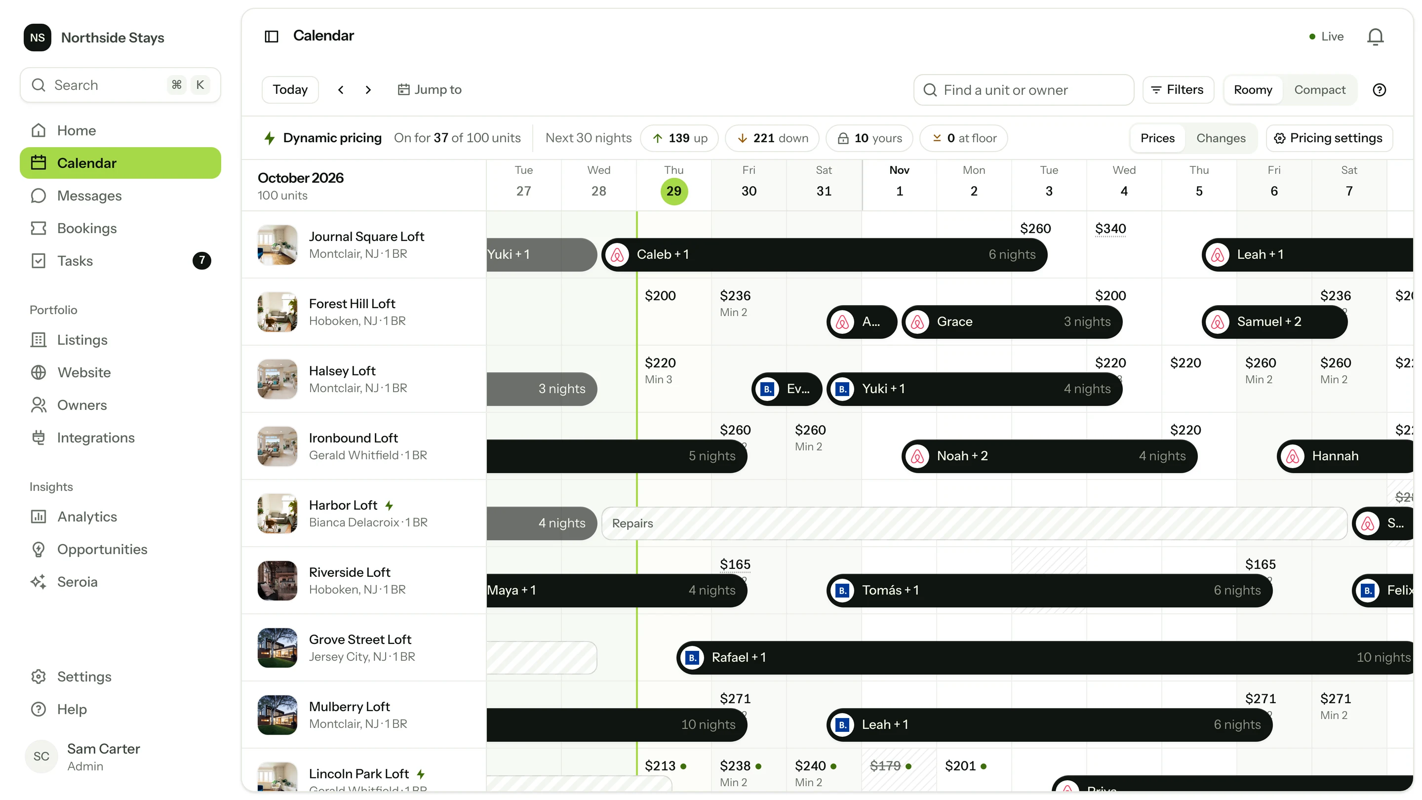 The calendar: every home a row, every night a column, with Airbnb and Booking.com stays across the nights.